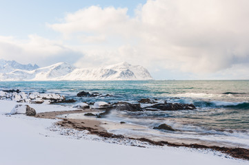 Beach covered with snow, Norway.