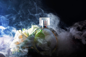 perfume bottle design photo with smoke for advertising