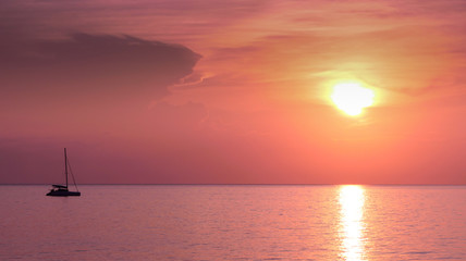 Fototapeta na wymiar Catamaran At Sunset