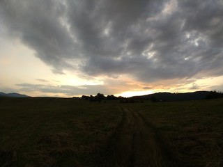 Sunrise or sunset over the hills and meadow. Slovakia