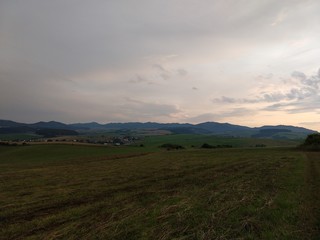 Sunrise or sunset over the hills and meadow. Slovakia