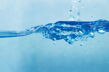 Fototapeta na wymiar Water Close up of splash of water forming