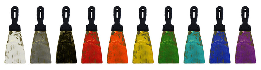 Multi-colored paint on a spatula isolated