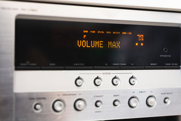 music buttons on display of an amplifier volume max
