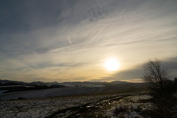 Sunrise or sunset over the hills and meadow. Slovakia