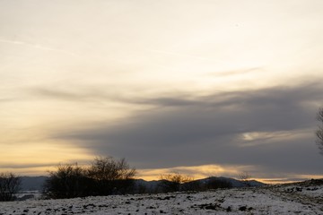 Sunrise or sunset over the hills and meadow. Slovakia