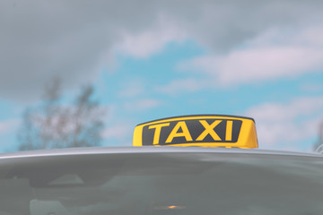 Detail of the taxi car on the street