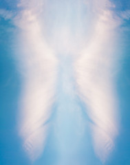 White angel shape on blue background, abstract graphic design edit creation as a symbol of light