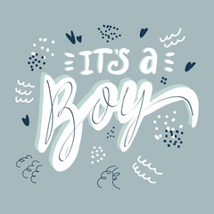 Its a boy lettering hand drawn illustration. White calligraphy on blue background. Gender reveal party vector greeting card. Cute baby postcard. Baby shower, arrival celebration.