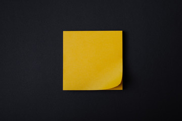 Yellow sticky notes on black background