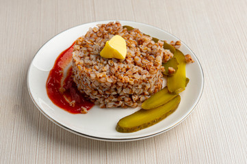 buckwheat with ketchup  and cucumbers
