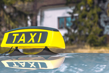 Detail of the taxi car on the street