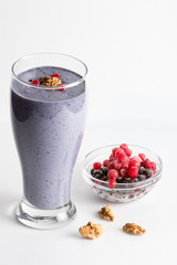 Smoothie from currants, blueberries and nuts for healthy breakfast