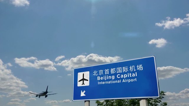 Jet airplane landing in Beijing, PEK, China. City arrival with airport direction sign. Travel, business, tourism and transport concept. 3D rendering animation.