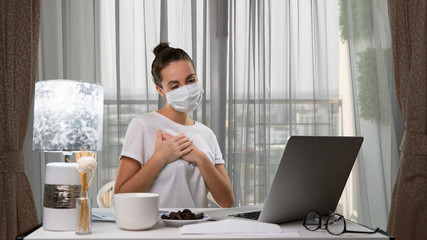 sick woman at home talks online by messenger with parents