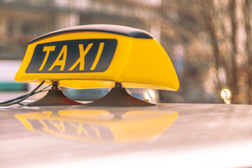 Detail of the taxi car on the street