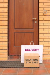 Delivery to the door of your home. Stay at home, self-isolation. Quarantine or self-isolation due to the Loved-19 pandemic. Label delivery, Stay home, stay safe
