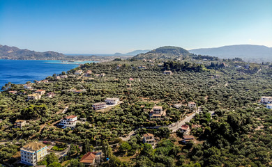 Landscape view towards the Zakynthos town and Bochali viewpoint with houses and olive groves in the foreground