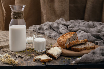 Meal with milk and bread in the country on World Milk Day. Horizontal shot.