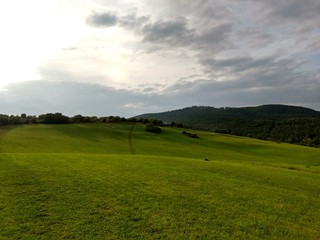 Sunrise or sunset over the hills and meadow. Slovakia