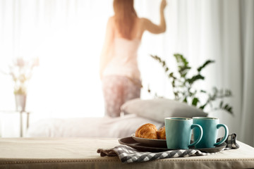 Spring morning at a wooden table in the moody sun with delicious coffee