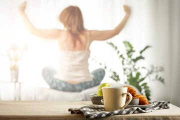 Spring morning at a wooden table in the moody sun with delicious coffee