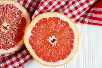 Fototapeta na wymiar grapefruit on a wooden background
