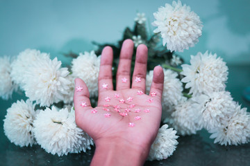 A guy holding sparkers.