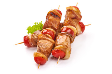Roasted Shish kebab. Skewers with pieces of grilled barbecue, isolated on white background