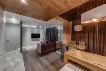 Interior of the apartment in a contemporary style. Living room and kitchen