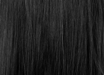 Healthy dark female hair, closeup