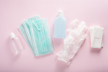 protective medical mask, sanitizer gel and gloves. protective measures against virus, bacteria