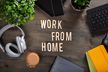 work from home text desk with keyboard computer smartphone notebook houseplants, workspace office...