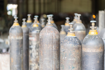 Compressed gas (argon or carbon dioxide or oxygen) steel cylinders for welding in metal workshop
