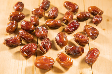 date fruits on wooden table