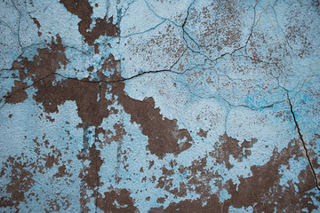 Colored old concrete wall with paint residues on the surface