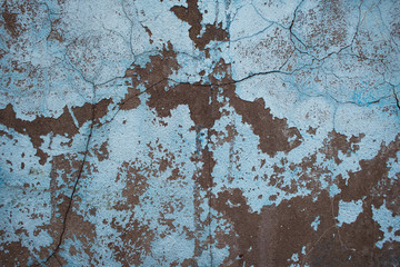Colored old concrete wall with paint residues on the surface