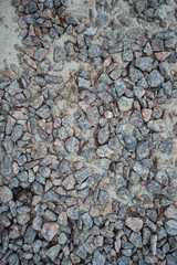 Fine light stones of granite as a texture