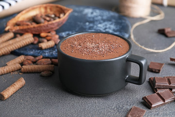 Cup of hot chocolate on table