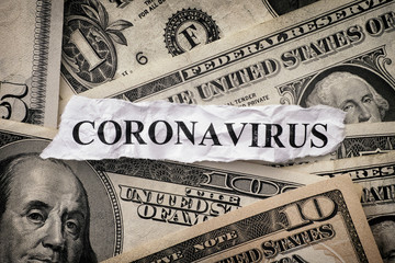 The word Coronavirus on american dollars.