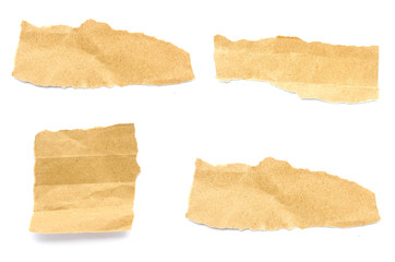 Recycled paper craft stick on a white background. Brown paper torn or ripped pieces of paper isolated on white background.