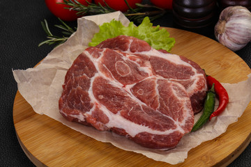 Raw pork neck steak