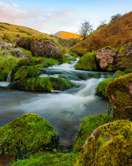 water stream flowing down the mountains