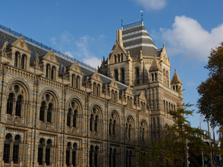Wonderful facade of the Natural History Museum in London with the blue sky