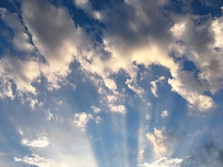 Fototapeta na wymiar Crepuscular Rays and Clouds