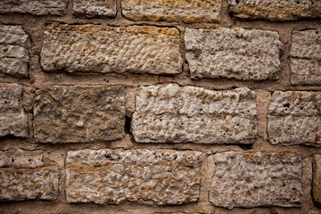 Old brick wall, a beautiful background for wallpaper, laminate, panels, furniture.