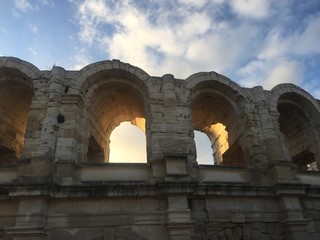 detail of ancient Roman theatre arches, in the sunset light - Arles, France