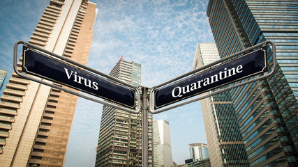 Fototapeta na wymiar Street Sign to Quarantine versus Virus