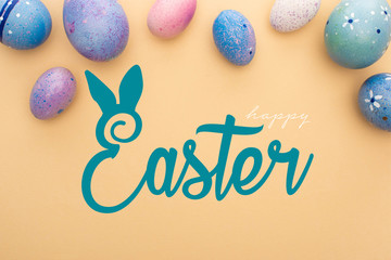 Top view of purple chicken eggs on beige background with happy Easter illustration