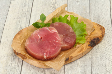 Raw tuna round steak for grill